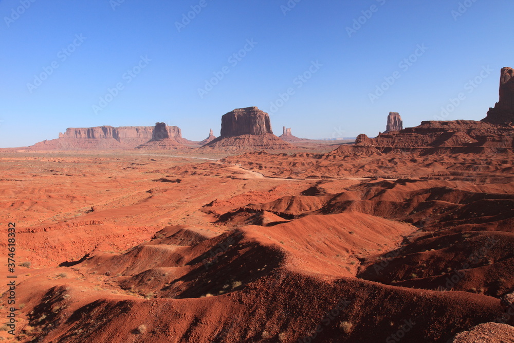 View of the Mittens and Merrick Butte from John Ford's Point overlook in Monument Valley Navajo Tribal Park, Arizona, USA View of the Mittens and Merrick Butte from John Ford's Point overlook in Monument Valley Navajo Tribal Park, Arizona, USA
