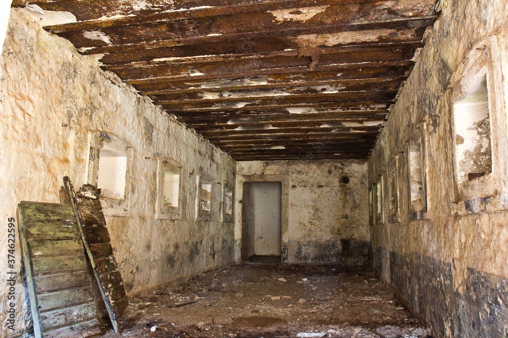 Abandoned fortress Kabala in Montenegro. Old stone empty room with windows.