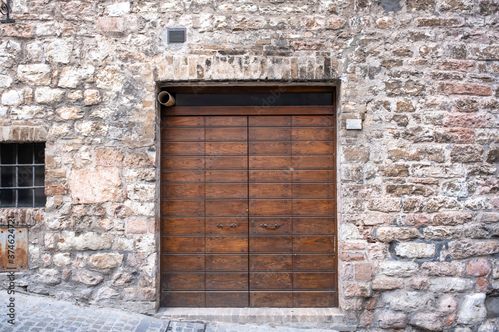 Old Wooden Door on Grunge Brick Wall