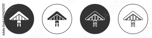 Black Hang glider icon isolated on white background. Extreme sport. Circle button. Vector Illustration.