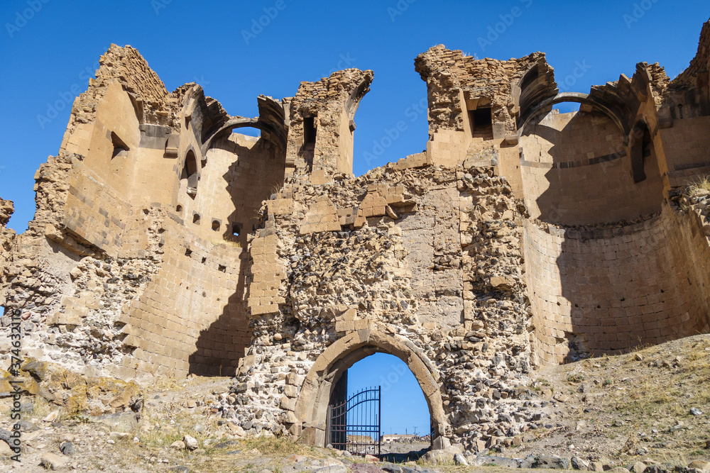 Ruins of gates of medieval city Ani, near Kars, Turkey. Founded in 5 century as Armenian city. Abounded in 15-16 centuries after series of conquests & earthquakes. Now it's UNESCO object