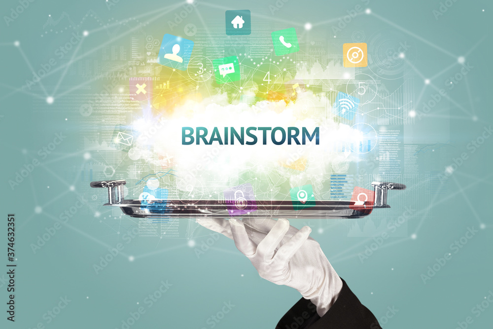 Waiter serving social networking concept with BRAINSTORM inscription Waiter serving social networking concept with BRAINSTORM inscription