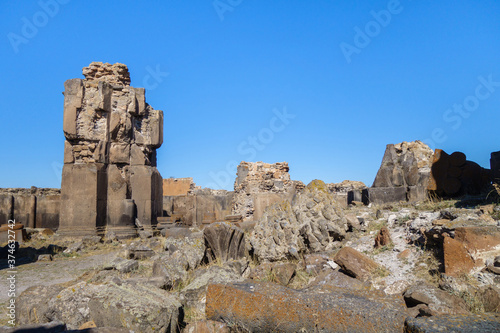 Ruins of columns & decorative elements inside church of St Gregory in medieval city Ani, near Kars, Turkey. Church was built in 1005 by King Gagik. Now it became tourist sight as UNESCO object photo