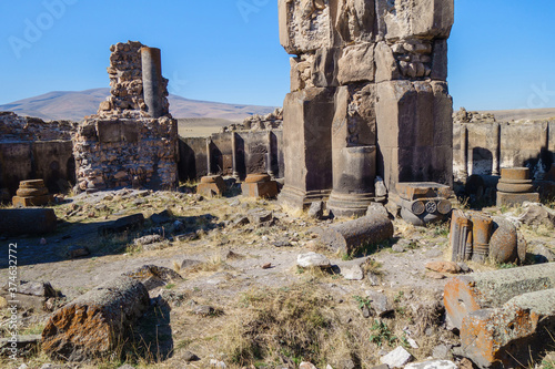 Remains of columns, walls & decorative elements inside church of St Gregory in medieval ghost town Ani, Kars, Turkey. Church was built in 1005 by King Gagik. Now it's tourist sight as UNESCO object