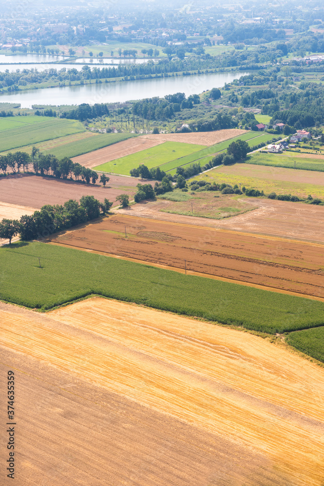 Aerial view of agricultural fields and lakes
