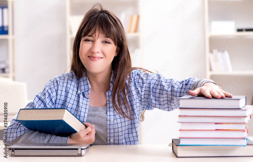 Young female student in educational concept Young female student in educational concept