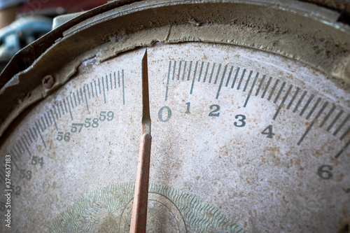 Wallpaper Mural A rusty old metal analog trade weight scale used in the market. Close-up. Selective focus. Torontodigital.ca
