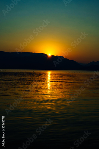  the sun rises over the mountains and the sea © Анна Молько