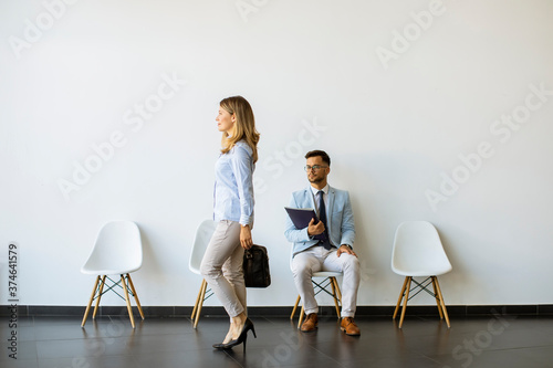 Businesswoman passing by yo...