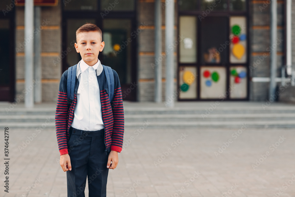 Young boy with backpack going back to school Young boy with backpack going back to school