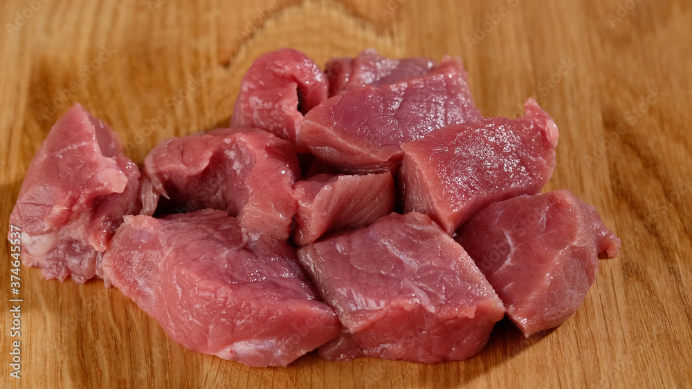 raw red meat on wooden board raw red meat on wooden board