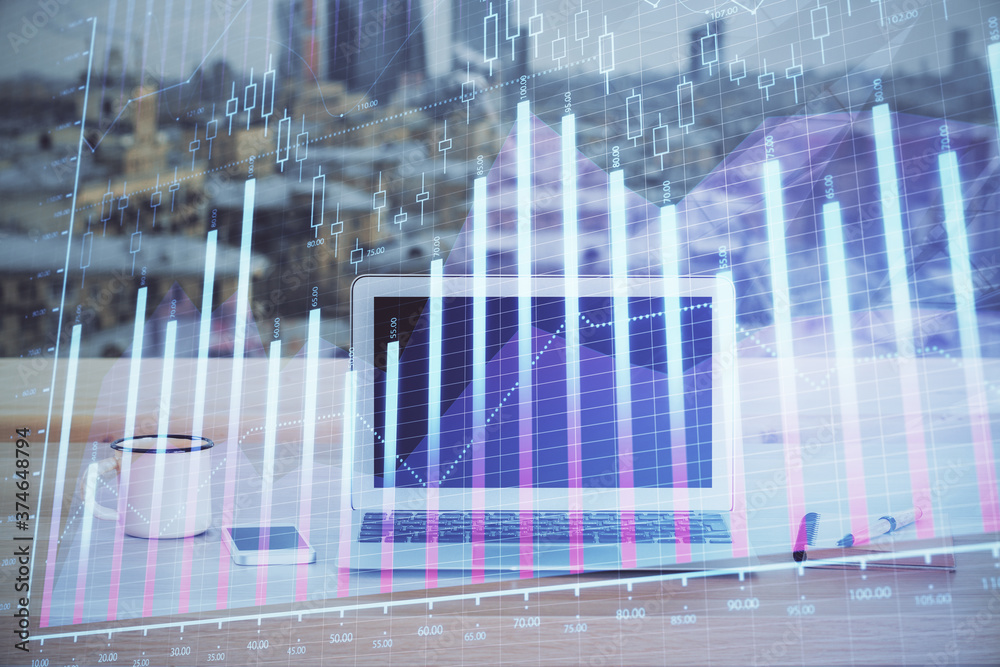 Financial graph colorful drawing and table with computer on background. Multi exposure. Concept of international markets. Financial graph colorful drawing and table with computer on background. Multi exposure. Concept of international markets.