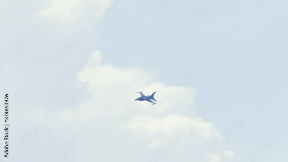 F6-C jet performing maneuvers at air show in Gdynia F6-C jet performing maneuvers at air show in Gdynia