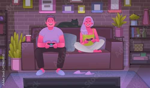 Happy guy and girl play video games on the game console. A couple of young people have fun together in the evening