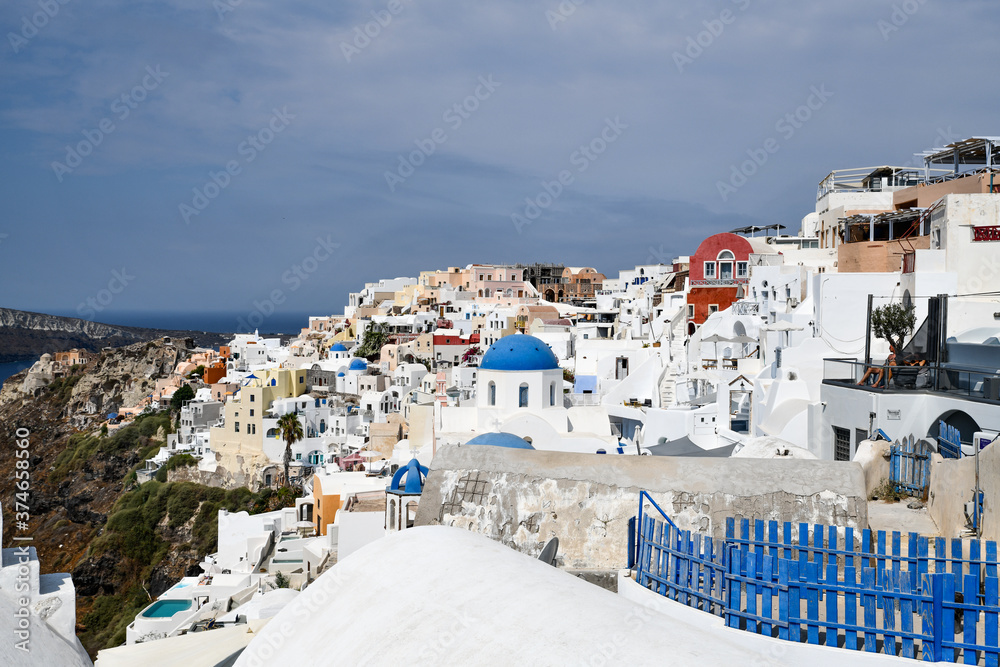 Fototapeta premium Blue domes of Santorini in Greece