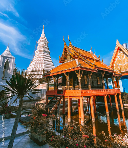 Around the khlong near Wat Paknam Bhasicharoen  a temple  pagoda and Buddha statue in Bangkok Thailand