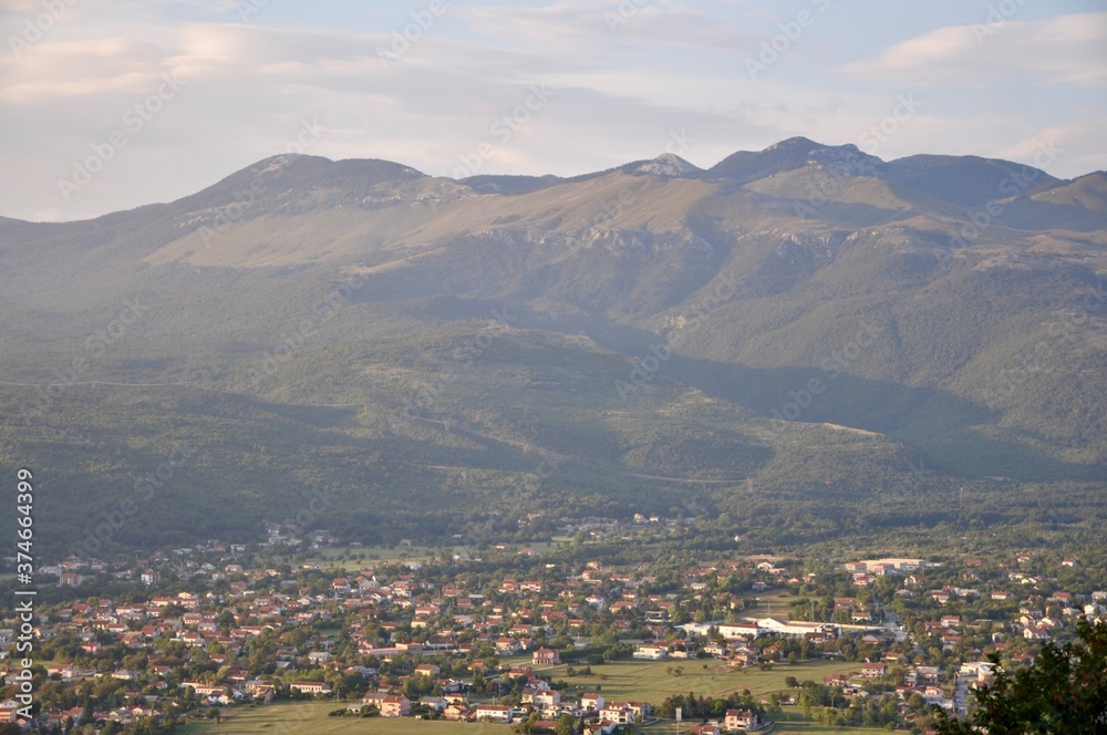 Grobnik field panorama and mountains in background. Mountain panorama view of landscape of Grobnik meadow.