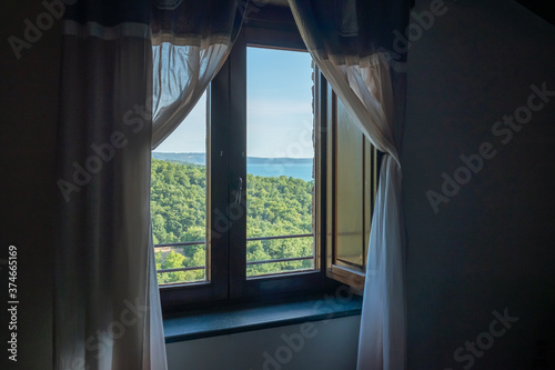 view from the window with net curtains
