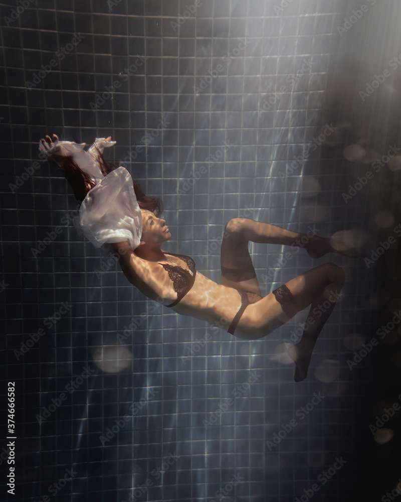 underwater girl in swimming pool