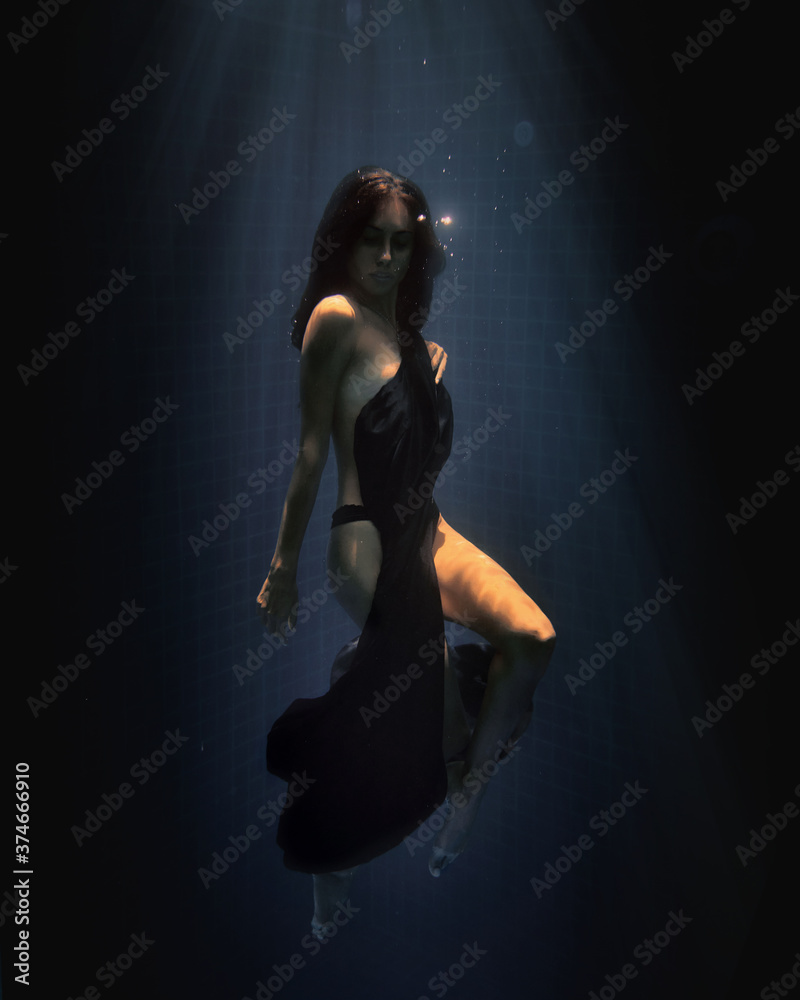 underwater girl in swimming pool