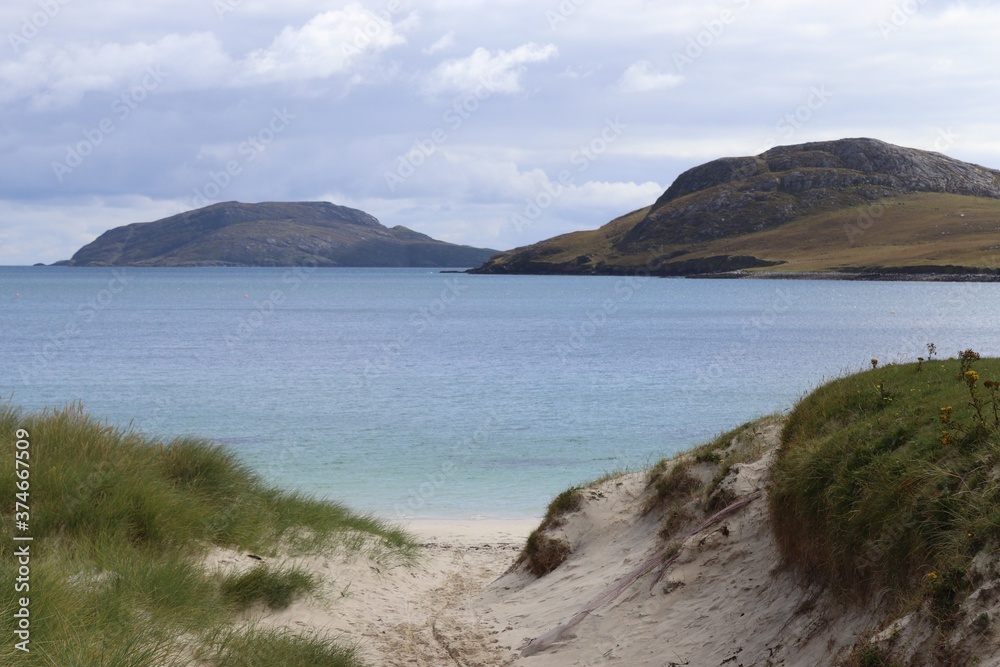 view of the coast of the sea, vatersay beach, hebrides, scotland