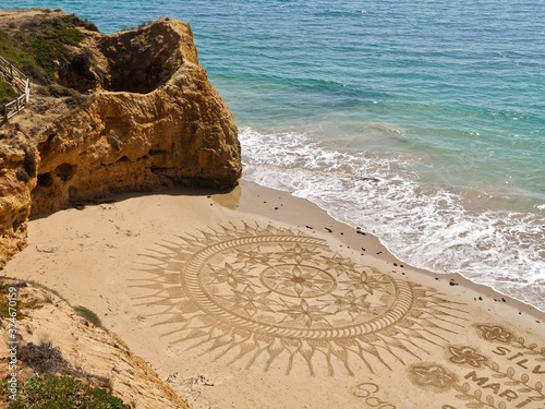 Beautiful beach mandala in Albufeira in Portugal Praia Maria Luisa