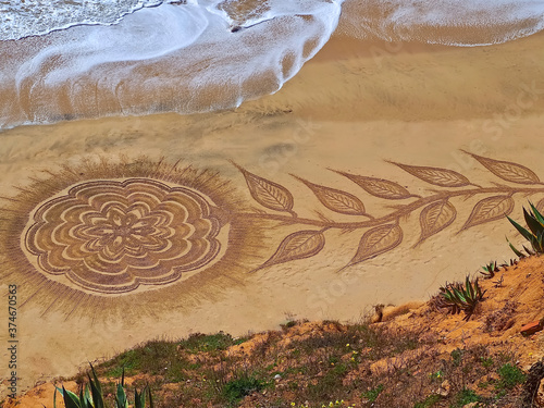 Beautiful beach mandala in Albufeira in Portugal Praia Maria Luisa photo