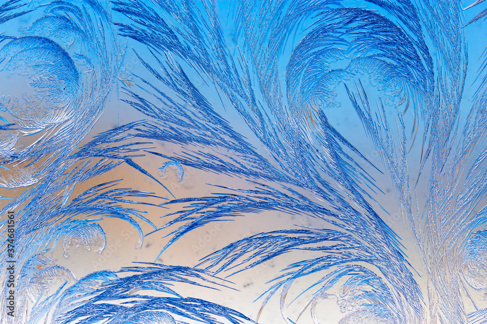 Obraz premium Natural pattern on glass at dawn of the sun.