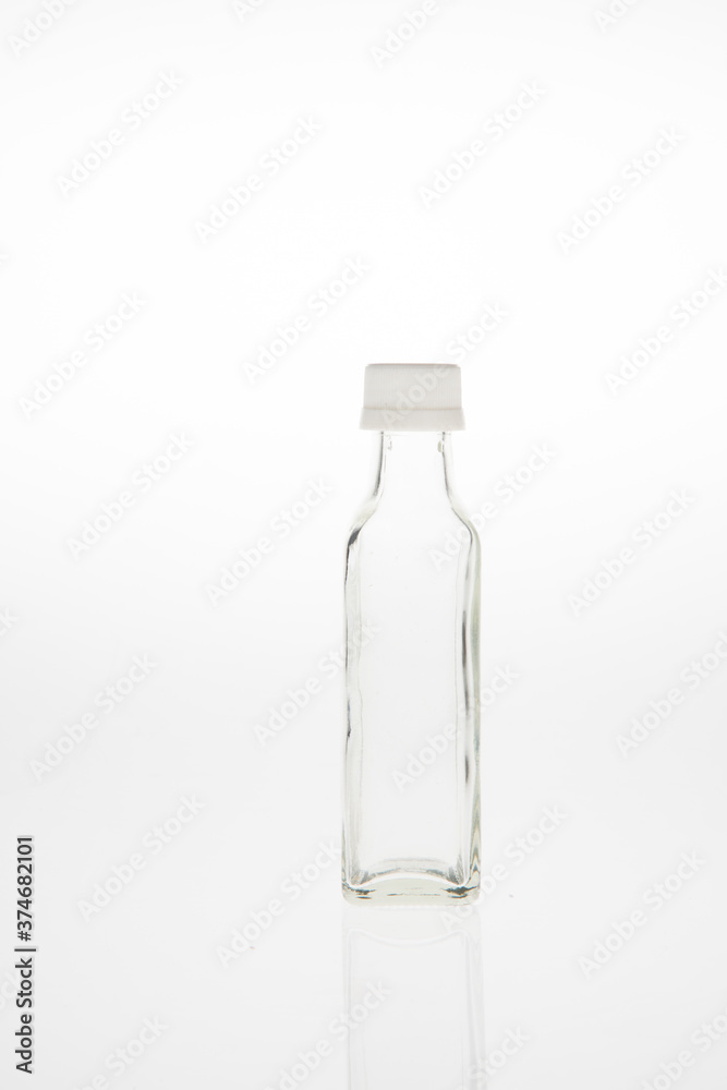 Glass bottle on white background isolated. Glass bottle on white background isolated.
