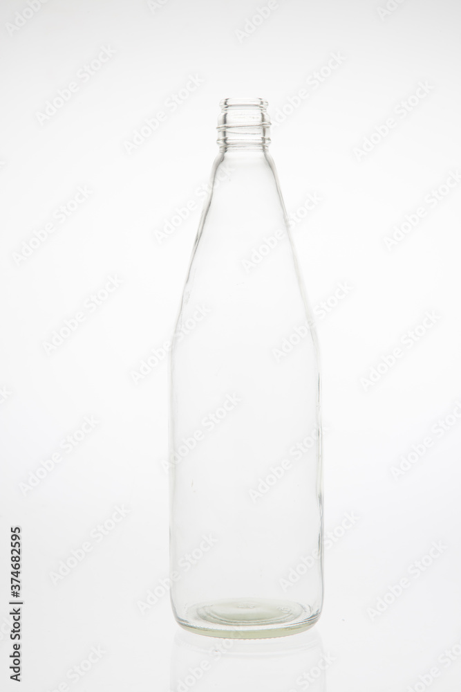 Isolated glass bottle on white background without cap. Isolated glass bottle on white background without cap.