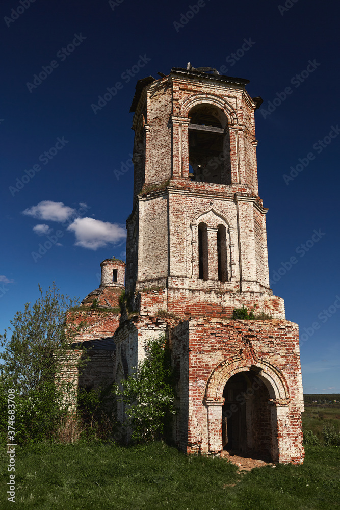 Vintage, destroyed, overgrown with grass to the Christian Orthodox Church
