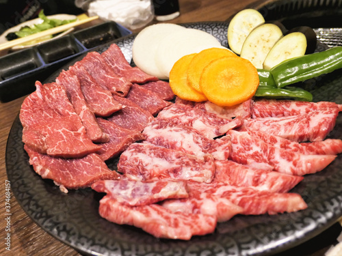 Raw Chiba wagyu beef slices in a plate