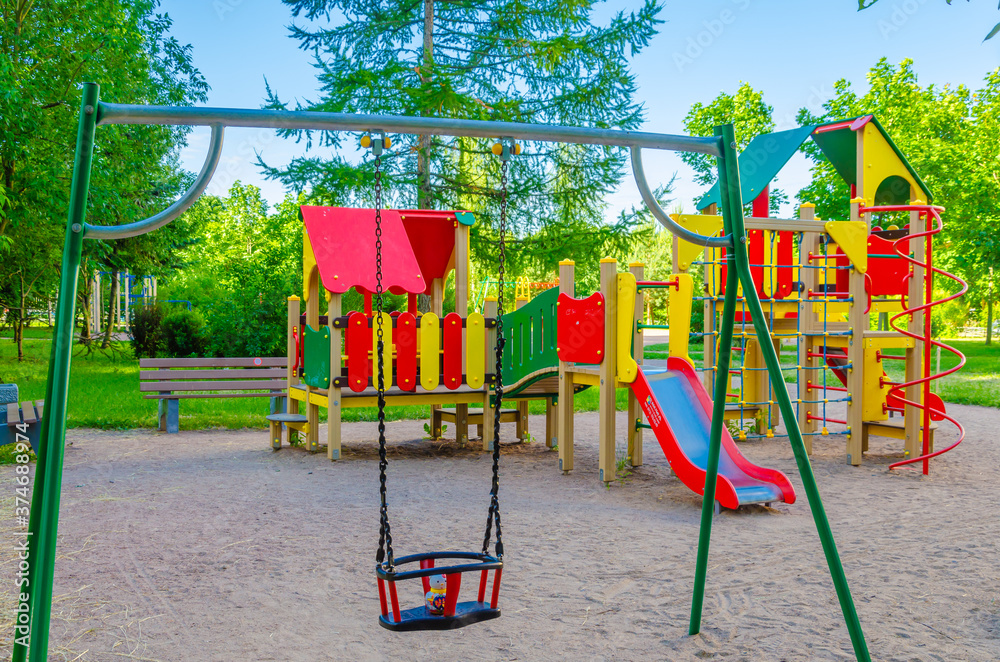 Children's Playground with slides and swings. Children's Playground with slides and swings.