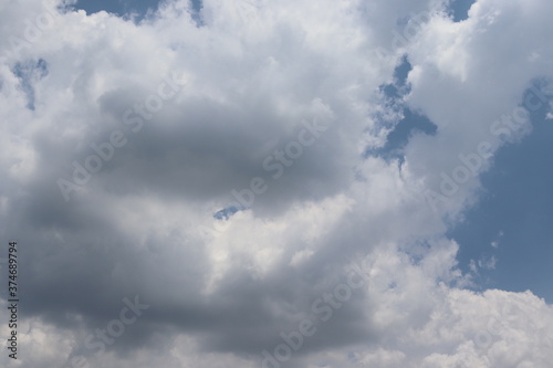 Blue sky with cloud backgrounds and textures closeup. Nature create very beautifully.