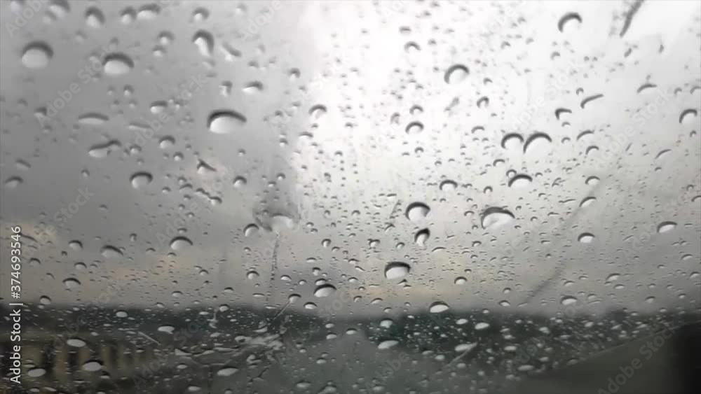 Slow Motion Of Rain Hitting On Glass Of A Moving Car On A Highway FHD 1080P