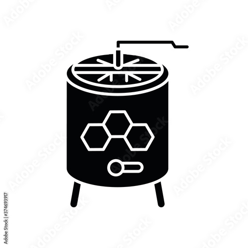 Honey extractor black glyph icon. Professional beekeeper tool. Apiculture silhouette symbol on white space. Mechanical device for honey extraction from honeycombs. Vector isolated illustration