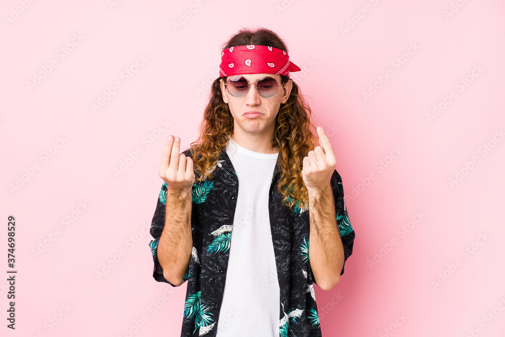Young hippie caucasian man isolated showing that she has no money. Young hippie caucasian man isolated showing that she has no money.
