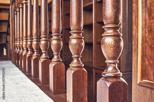 Quadro su tela Wooden balustrade of classic staircase in modern house. Close-up