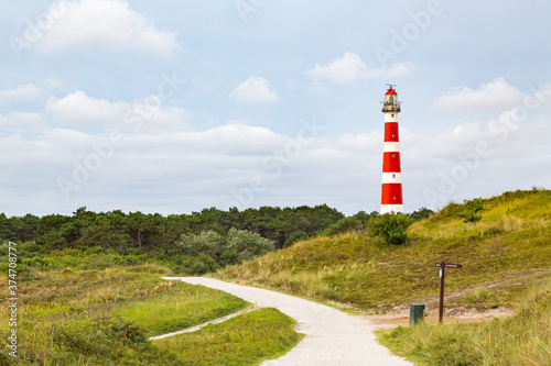 Lighthouse in a rural landscape on an island in the North Sea, Ameland, Holland