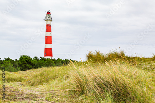 Lighthouse in a rural landscape on an island in the North Sea  Ameland  Holland