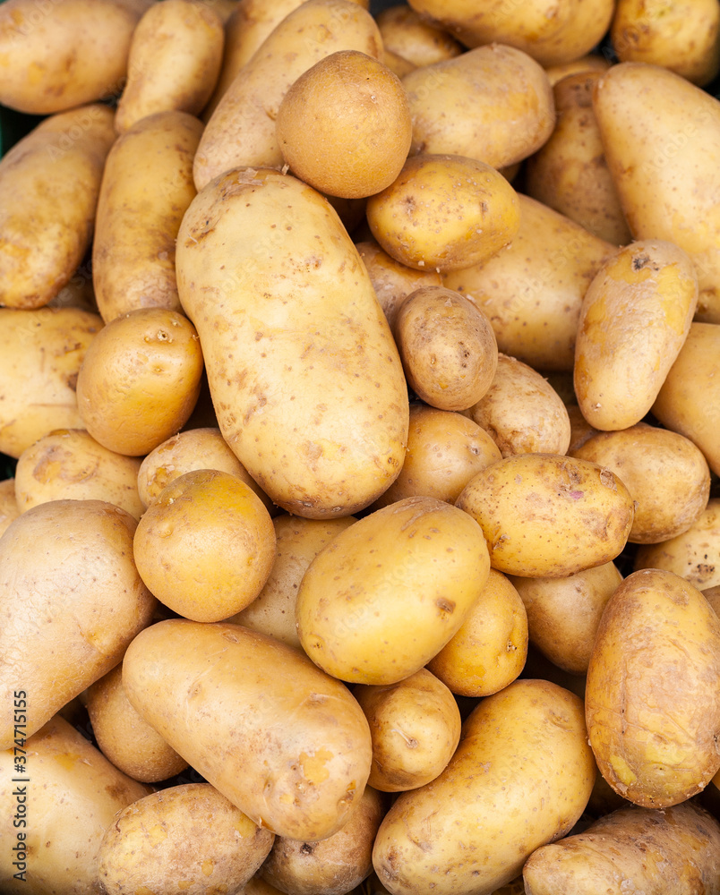 Detail of some potatoes in a street market. Detail of some potatoes in a street market.