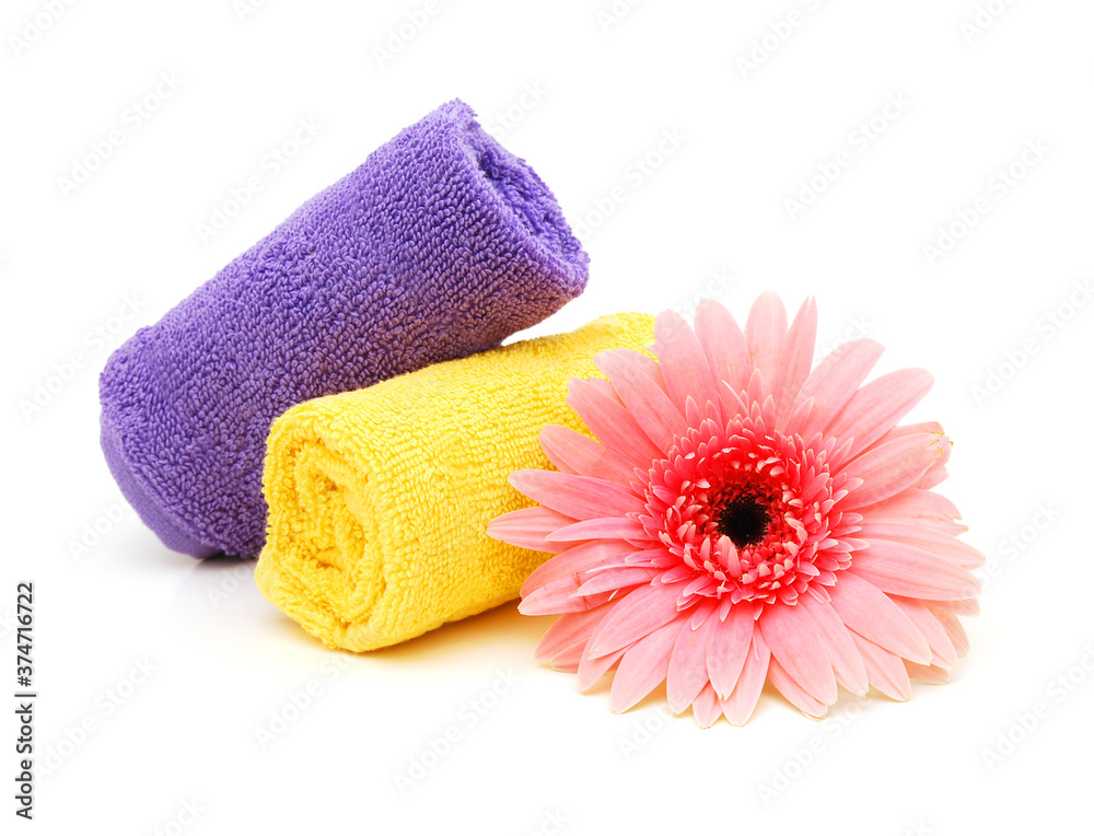 colorful stacked bathroom towels on a white background colorful stacked bathroom towels on a white background