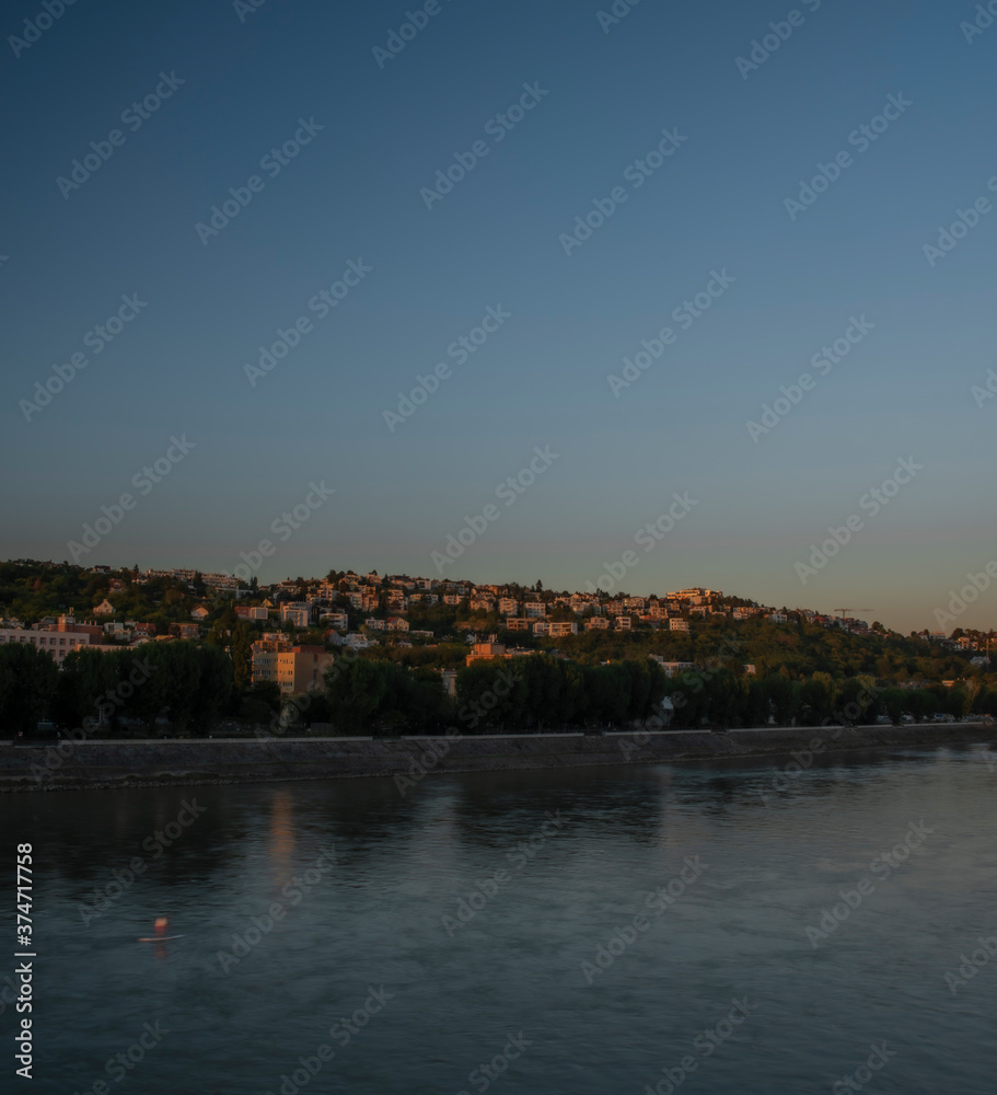Obraz premium Bratislava capital in summer evening with color sunset and river Donau