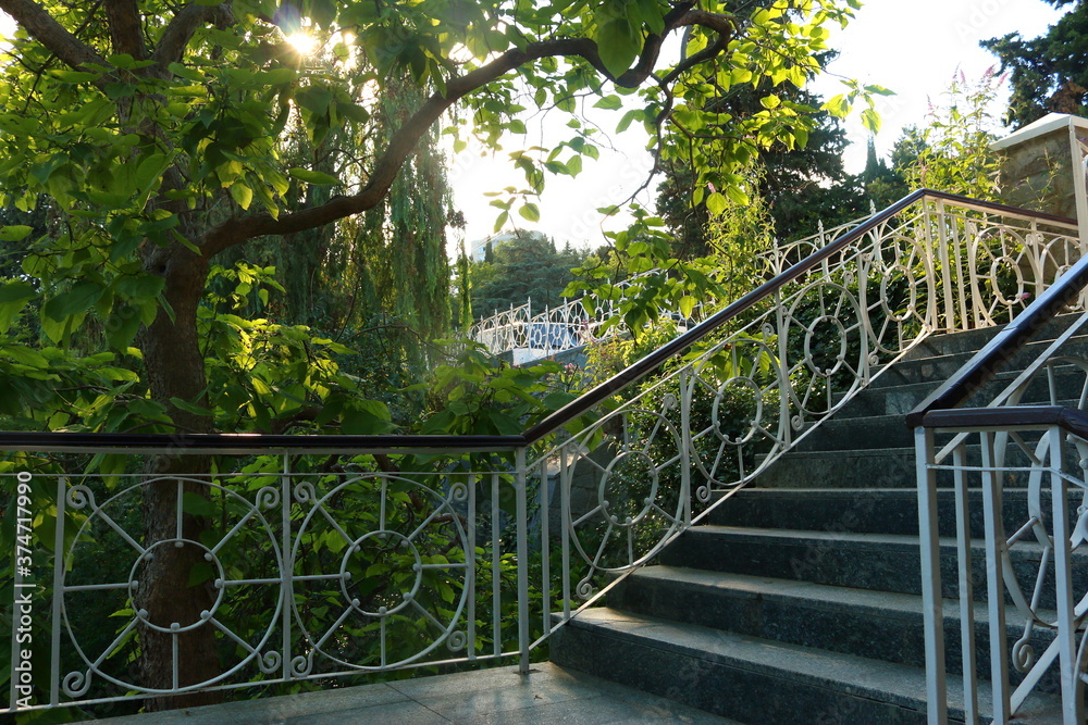 Antique staircase with wrought iron decor
