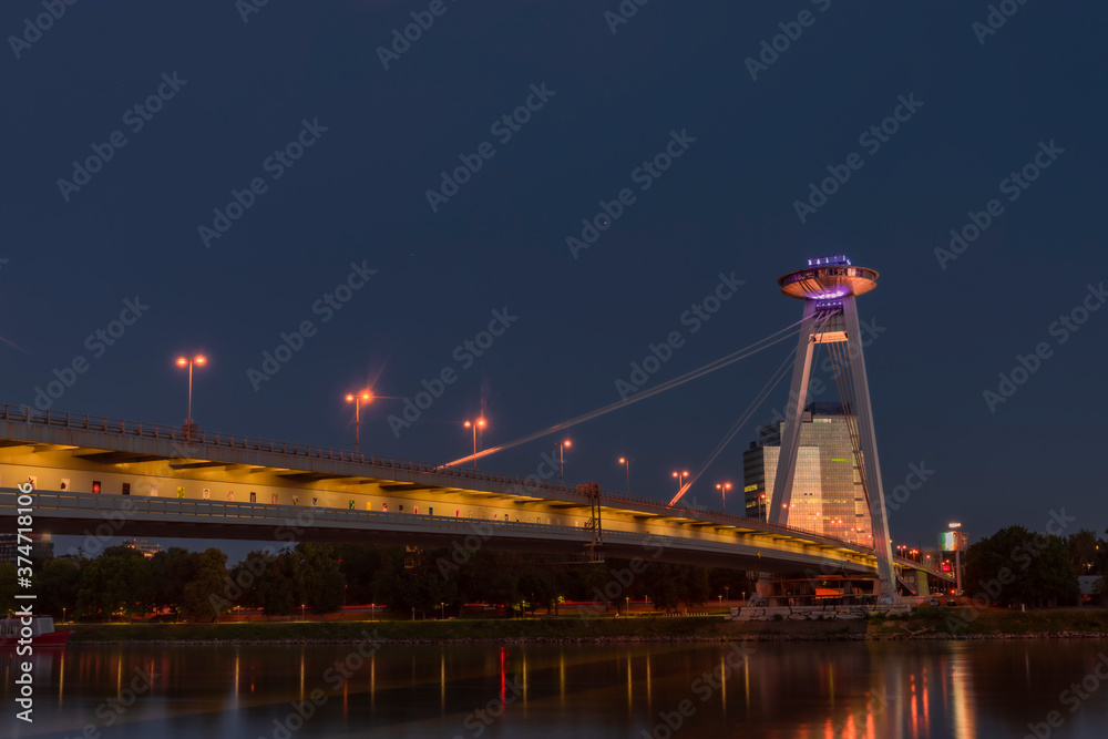 Bratislava capital in summer evening with color sunset and river Donau
