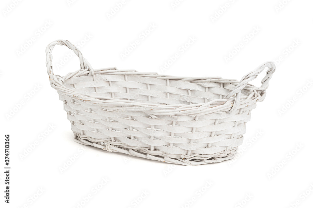 Obraz premium White wicker basket isolated on white background