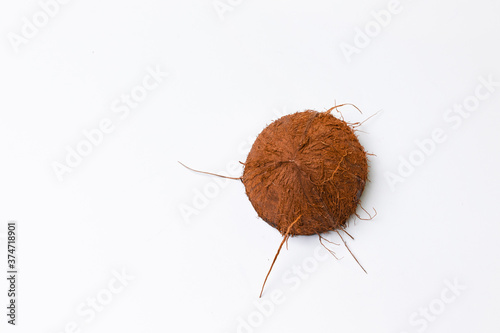 Raw coconut on gray background. Healthy healthy food concept