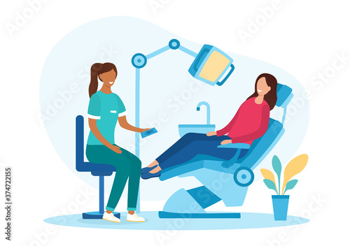Woman patient in a dentists chair with a female dental assistant or dentist in her surgery, colored vector illustration