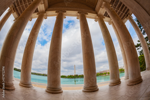 United States: Thomas Jefferson Memorial columns and interior over Washington monument column photo