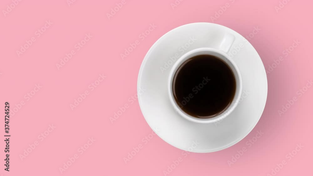 white coffee cup with hot espresso animated on a pastel pink background top view. seamless looping of realistic 3d food and drink. minimal motion design art with copy space
white coffee cup with hot espresso animated on a pastel pink background top view. seamless looping of realistic 3d food and drink. minimal motion design art with copy space